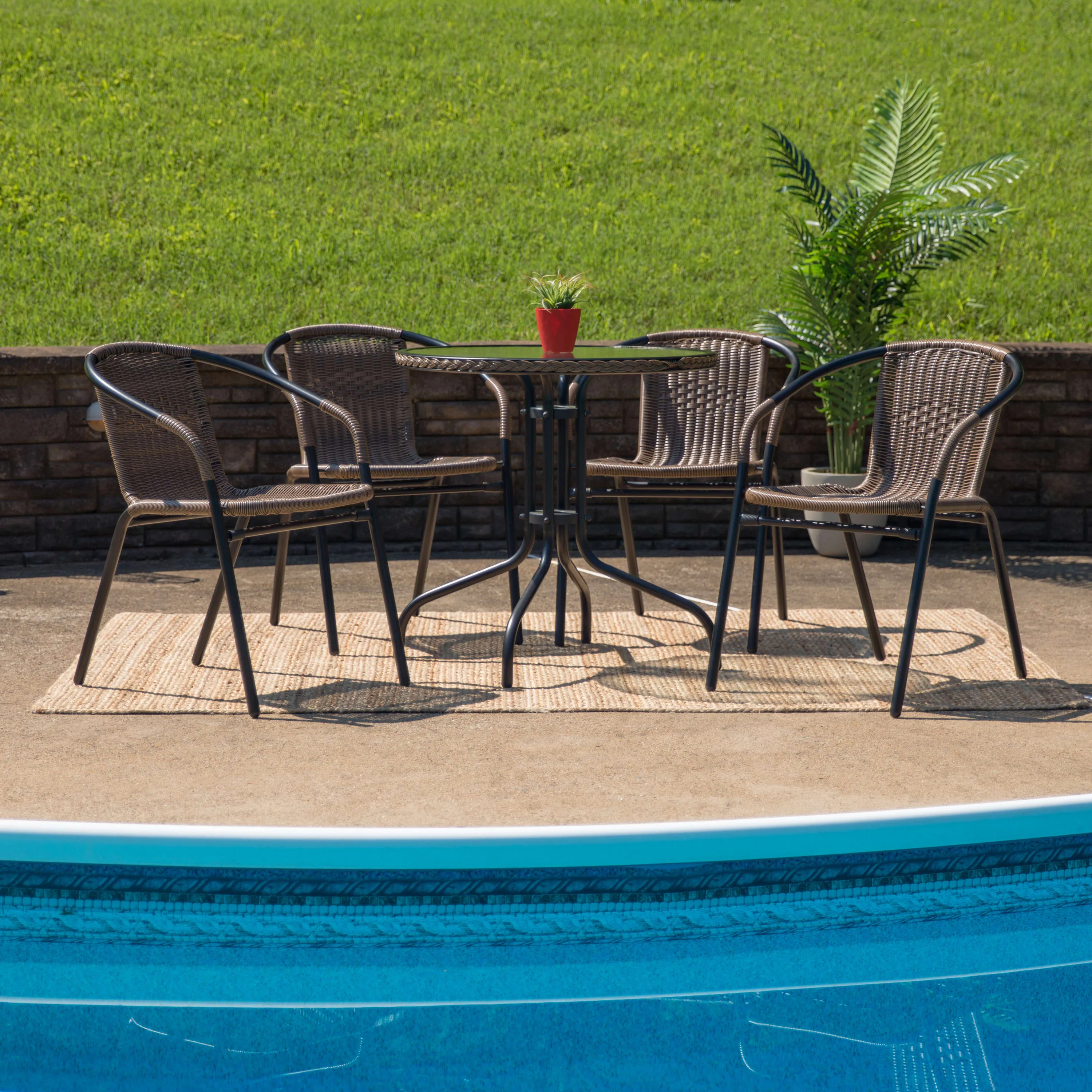 Barker 28'' Round Glass Metal Table with Rattan Edging and 4 Rattan Stack Chairs